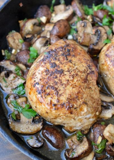 These Cast Iron Pork Chops with Mushrooms is the perfect low-carb weeknight dinner for two! Ready in under 30 minutes with just 8 net carbs, this keto-friendly dinner will be a quick favorite!