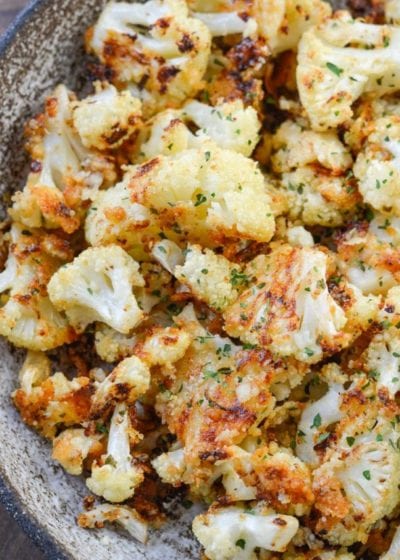 Parmesan Roasted Cauliflower is perfectly seasoned and roasted until crisp and full of flavor! Each serving has about 3 net carbs, making it an excellent keto side dish!