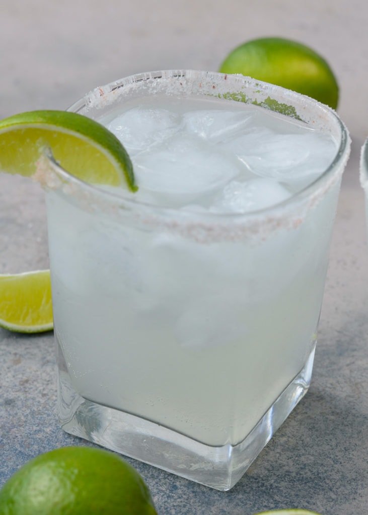 This Keto Margarita is a low-carb, low-calorie dream! Using a sugar-free simple syrup makes this keto alcoholic drink under 2 net carbs and about 100 calories each-- perfect for Taco Tuesday!