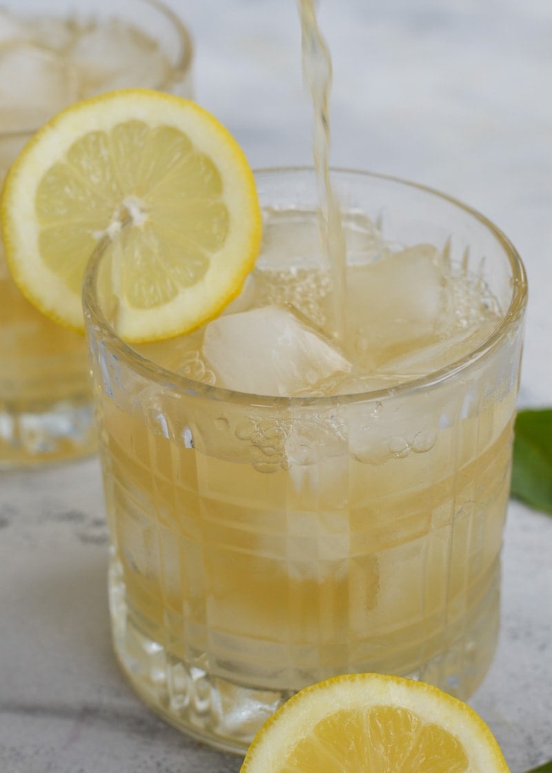 This Basil Whiskey Sour is sugar free and perfect for a keto cocktail! A classic bourbon drink with an herby twist makes for your new favorite summer drink... All for under 2 net carbs each!