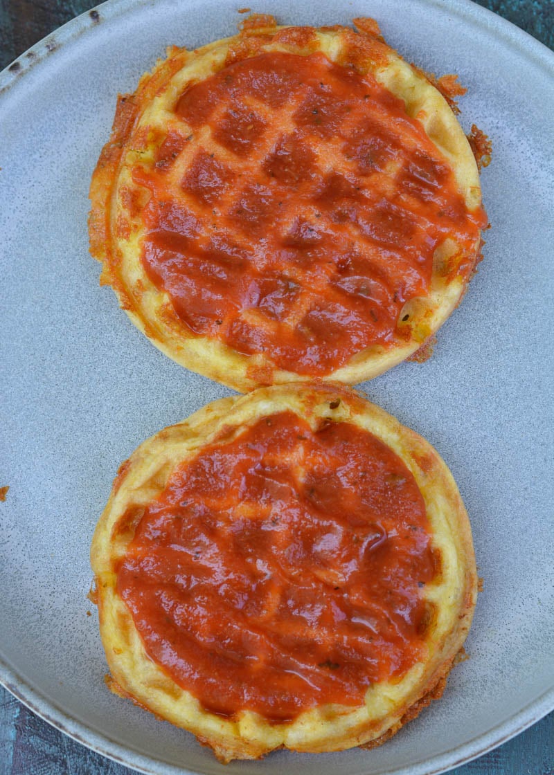 Learn how to make a Pizza Chaffle! This quick and easy keto pizza recipe is perfect for lunches or busy weeknights! Each low carb pizza has just 1.8 net carbs! 