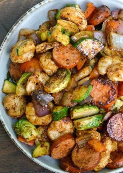 This Cajun Shrimp and Sausage Skillet is the perfect 20 minute dinner! This easy keto recipe is packed with smoked sausage, cajun shrimp and tons of vegetables!