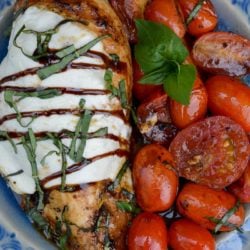 This one pan Chicken Caprese is loaded with pan seared chicken, fresh tomatoes, mozzarella in a creamy balsamic glaze! Enjoy a generous serving of this easy chicken recipe for about 4 net carbs!