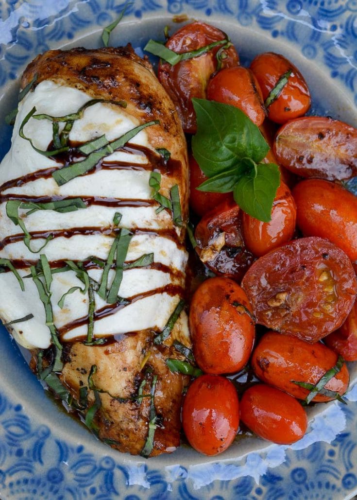 This one pan Chicken Caprese is loaded with pan seared chicken, fresh tomatoes, mozzarella in a creamy balsamic glaze! Enjoy a generous serving of this easy chicken recipe for about 4 net carbs!