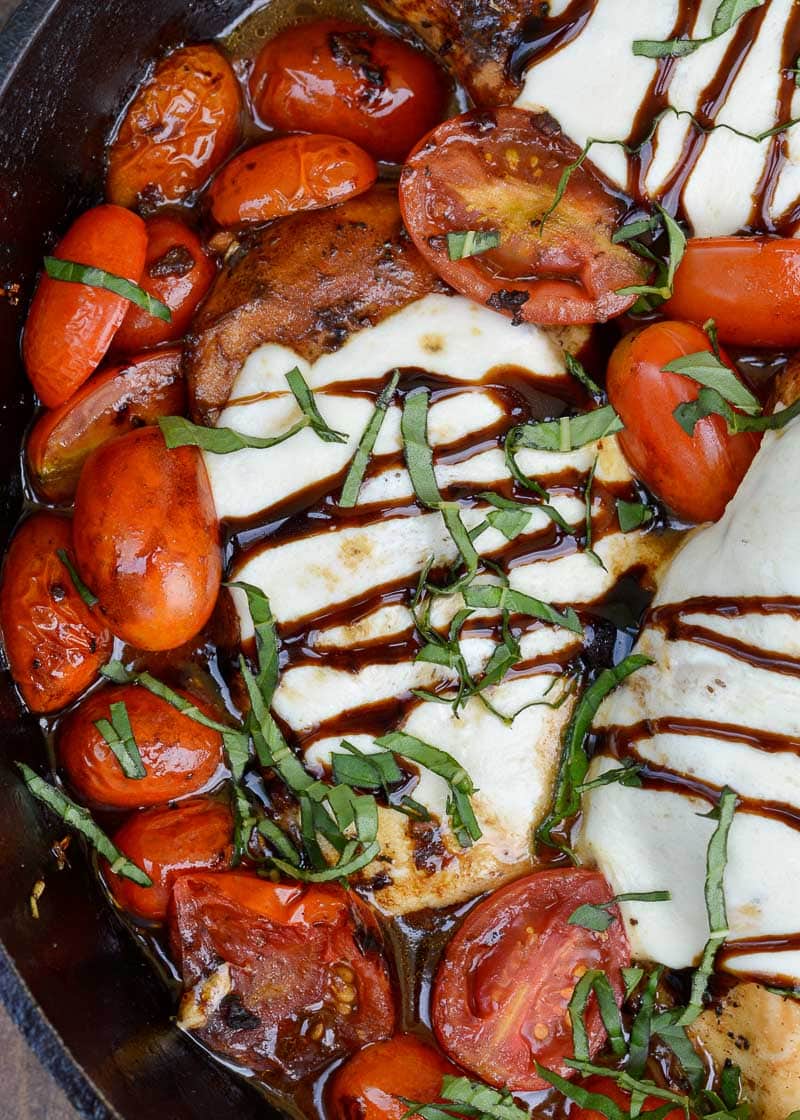 This one pan Chicken Caprese is loaded with pan seared chicken, fresh tomatoes, mozzarella in a creamy balsamic glaze! Enjoy a generous serving of this easy chicken recipe for about 4 net carbs!