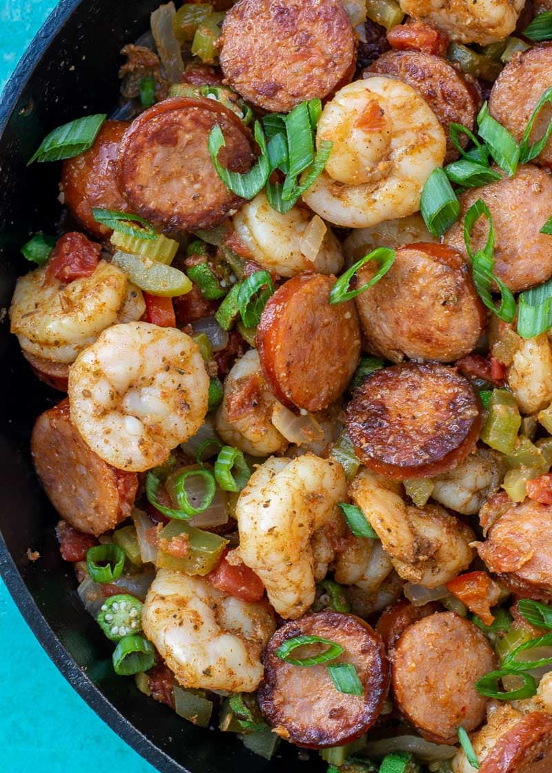 This Creole Shrimp and Sausage Skillet is the perfect 20 minute dinner recipe! This dish is packed with smoked sausage, tender shrimp, and vegetables in a buttery cajun sauce!