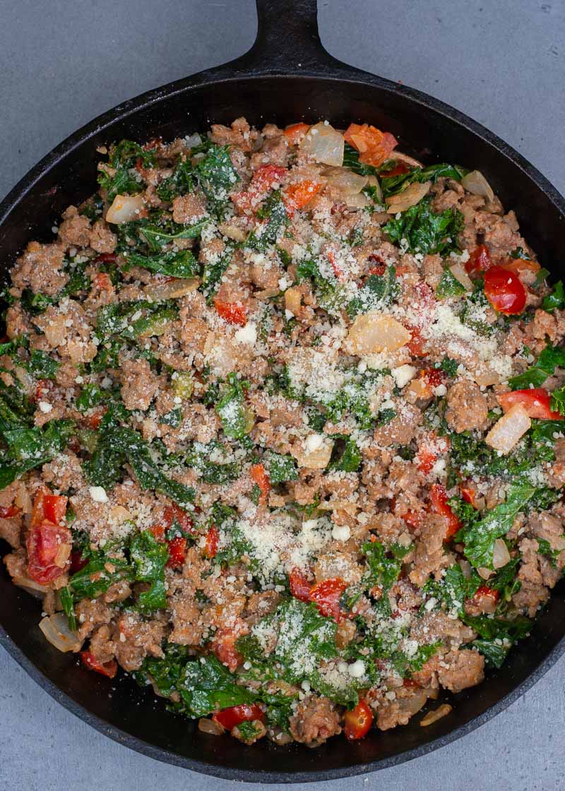 This simple Italian Sausage and Kale skillet is a hearty one pan meal loaded with meat and vegetables! Enjoy a generous helping for just 6 net carbs!