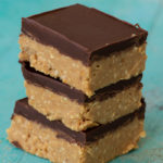These No Bake Peanut Butter Bars are full of crunchy peanuts and rich dark chocolate! These bars are under 3 net carbs the perfect way to satisfy your sweet tooth!