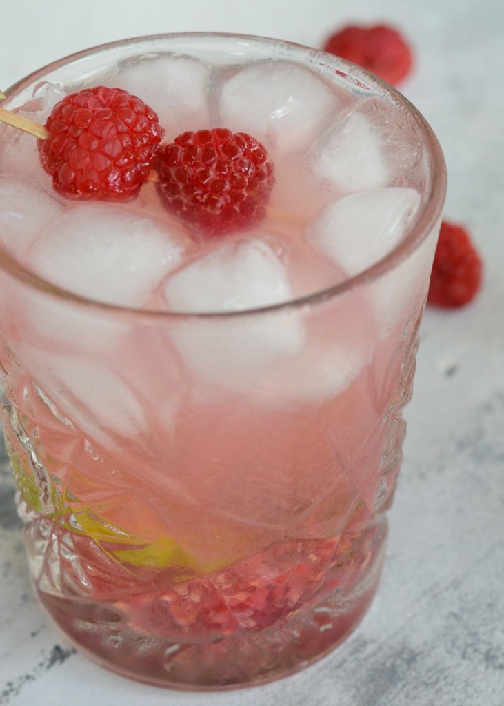 This Keto Raspberry Tequila Smash is the perfect keto drink! Mint, tequila and a sugar free simple syrup are combined in this delicious skinny cocktail, all for under 3 net carbs!