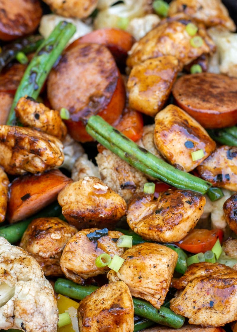 This BBQ Chicken and Smoked Sausage Skillet is the perfect one pan dinner! This meal is loaded with veggies and protein and is about 4 net carbs!