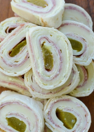 These Keto Italian Pinwheels are the perfect appetizer or party snack! Enjoy five cheesy, salty pinwheels for about 4 net carbs each!