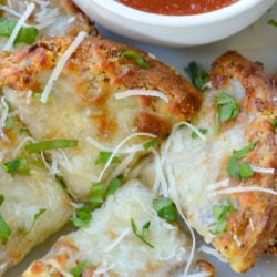 These Keto Garlic Bread Chaffles are perfect with a low-carb soup! For just 2.4 net carbs per chaffle, you'll want this cheesy, gluten-free garlic bread with every meal!
