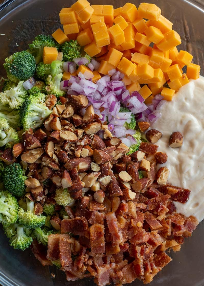 This Broccoli Salad with Bacon is the perfect quick and easy side dish! This keto salad has about 4 net carbs per serving and is always a crowd pleaser!