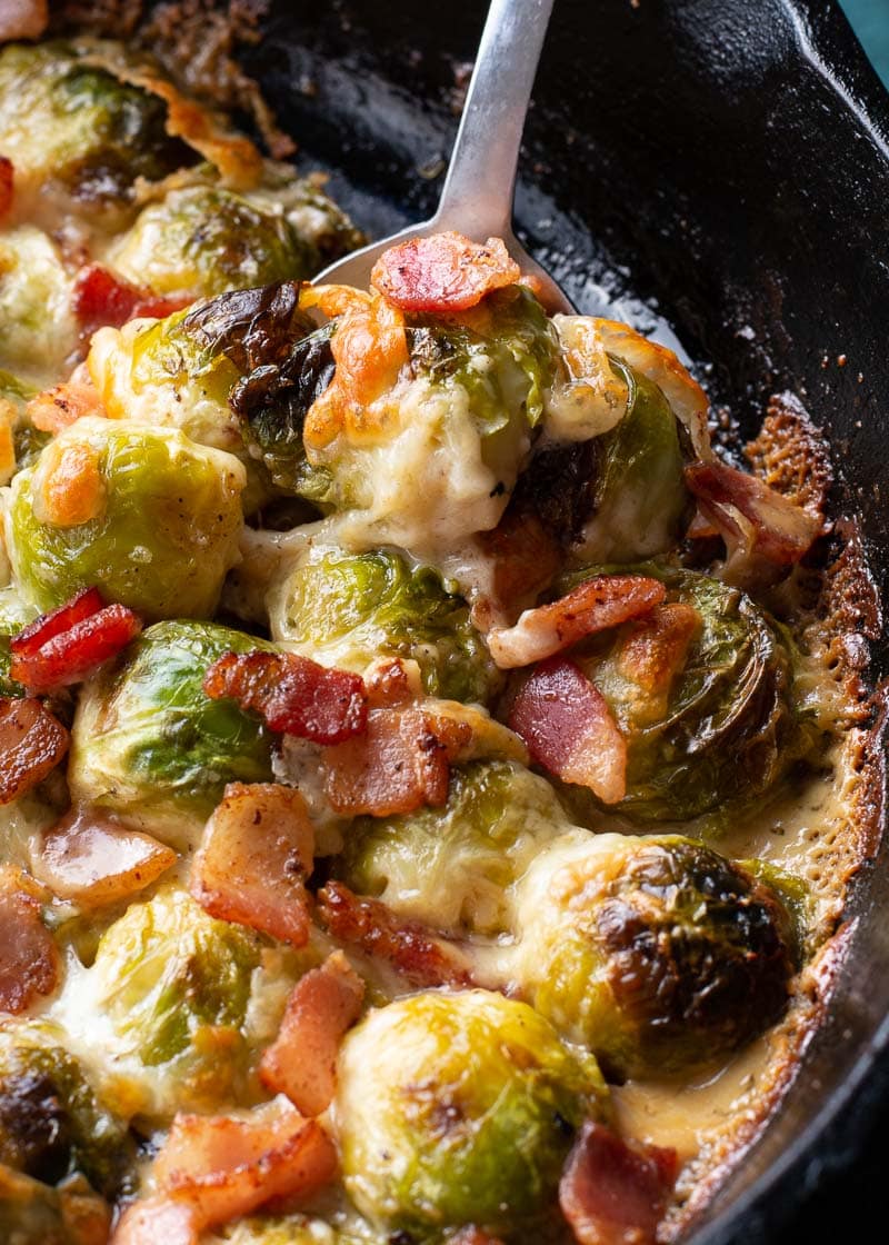 These Cheesy Brussels Sprouts with Bacon are made in one pan and perfect for entertaining! This easy vegetable side dish is low carb and keto-friendly! 