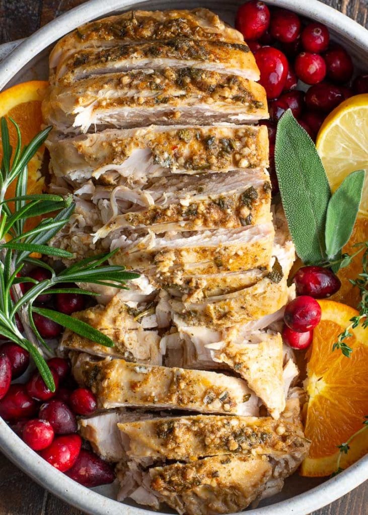 This Crockpot Turkey Breast is the perfect foolproof turkey recipe! This turkey breast is smothered in an herb butter and comes out perfectly tender and juicy every single time!Â