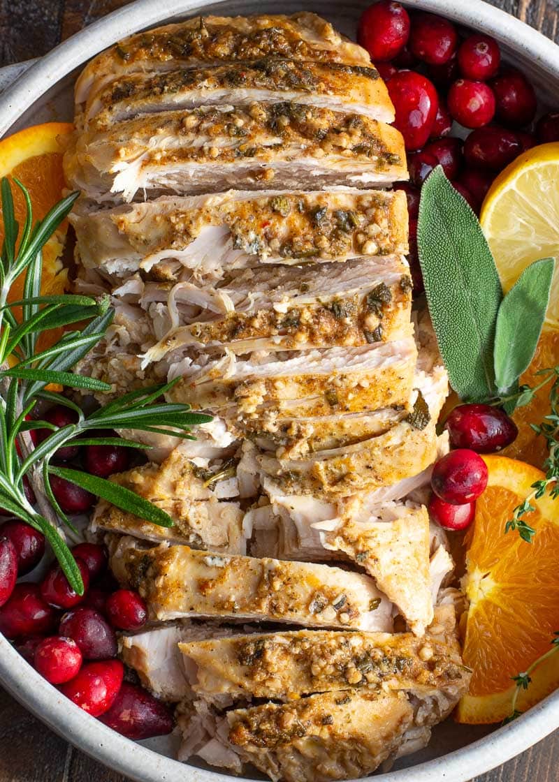This Crockpot Turkey Breast is the perfect foolproof turkey recipe! This turkey breast is smothered in an herb butter and comes out perfectly tender and juicy every single time! 