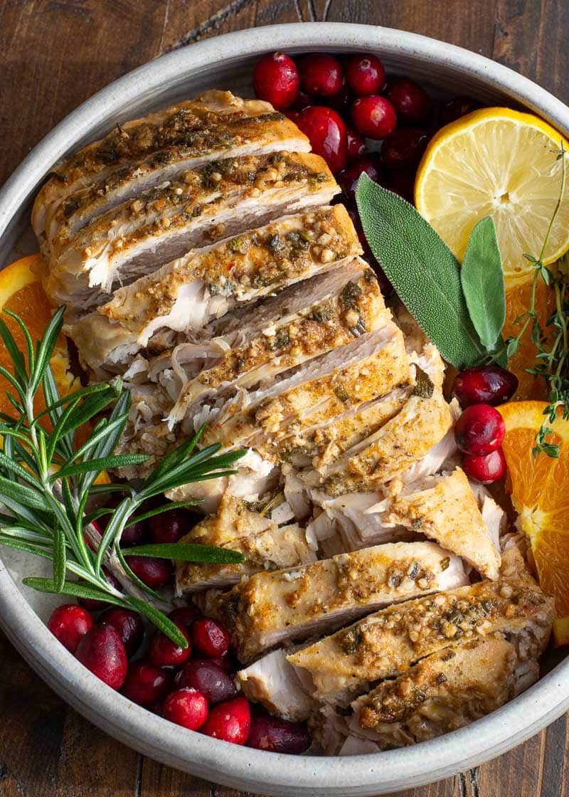 This Crockpot Turkey Breast is the perfect foolproof turkey recipe! This turkey breast is smothered in an herb butter and comes out perfectly tender and juicy every single time! 