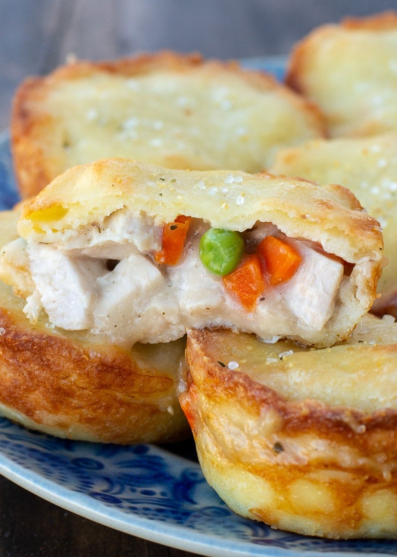 These delightful Mini Turkey Pot Pies are the perfect way to use leftover turkey! Each mini pie is loaded with turkey, vegetables and a creamy sauce for about 2 net carbs each! 
