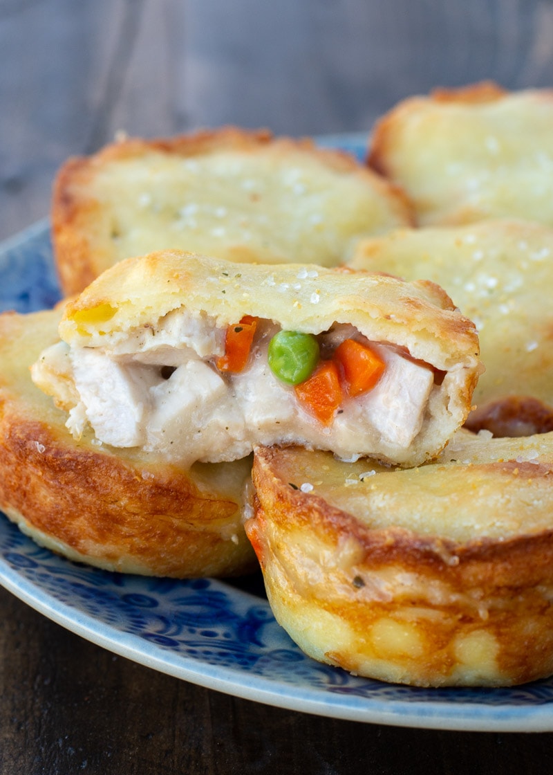 These delightful Mini Turkey Pot Pies are the perfect way to use leftover turkey! Each mini pie is loaded with turkey, vegetables and a creamy sauce for about 2 net carbs each!
