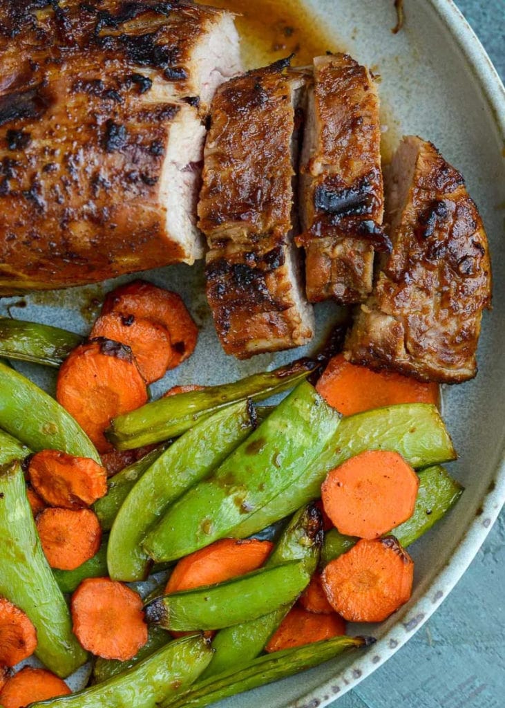 This Asian Pork Tenderloin with Air Fryer Vegetables is the perfect 15 minute meal! This weeknight dinner recipe is healthy, low carb and gluten free.