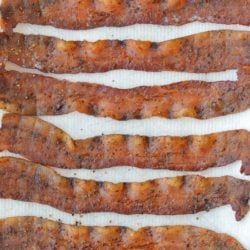 You will love this Candied Bacon, a salty, sweet, peppery snack that is also keto-friendly! Use low-carb maple flavored syrup for a treat that works for keto breakfast as well as it does for dessert!