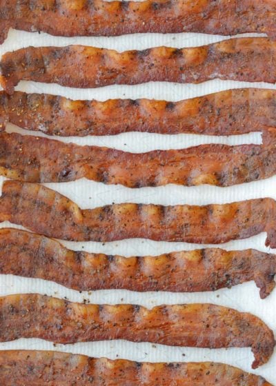 You will love this Candied Bacon, a salty, sweet, peppery snack that is also keto-friendly! Use low-carb maple flavored syrup for a treat that works for keto breakfast as well as it does for dessert!