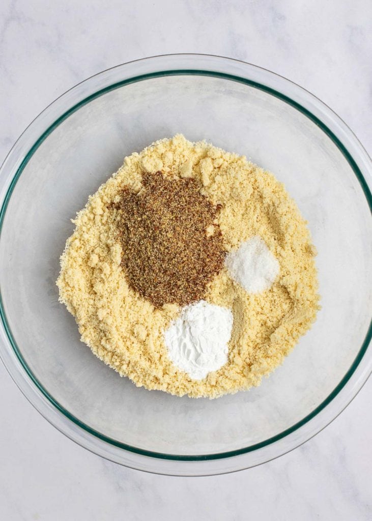 dry ingredients for keto dinner rolls in a mixing bowl