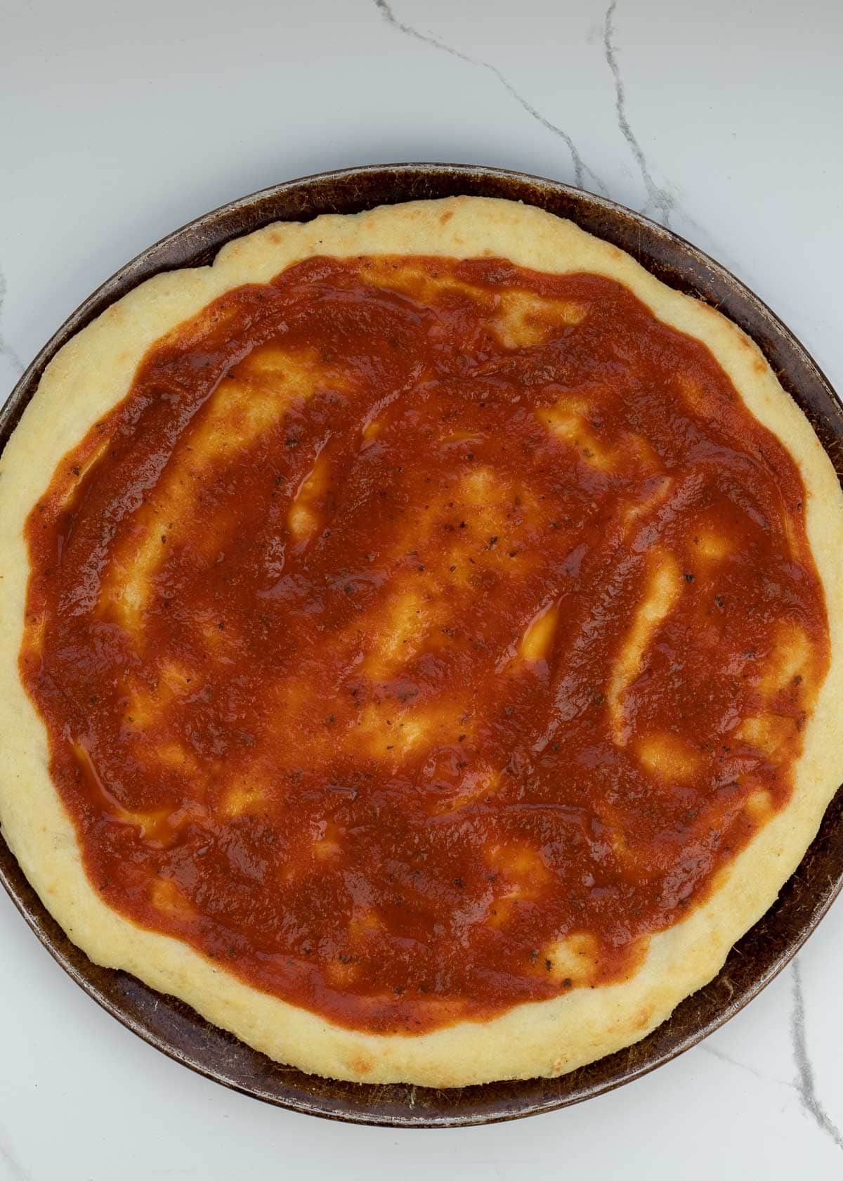 This step-by-step guide will show you exactly how to make the best Keto Pizza Recipe! This low carb pizza crust is crispy and delicious! Enjoy a slice of this keto pizza for about 3 net carbs!