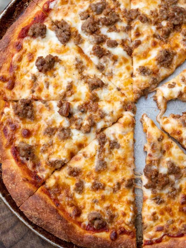 Follow this step by step guide to make the BEST Keto Pizza Crust Recipe! This crust is made from a fat head dough base and is low carb, grain and gluten free!