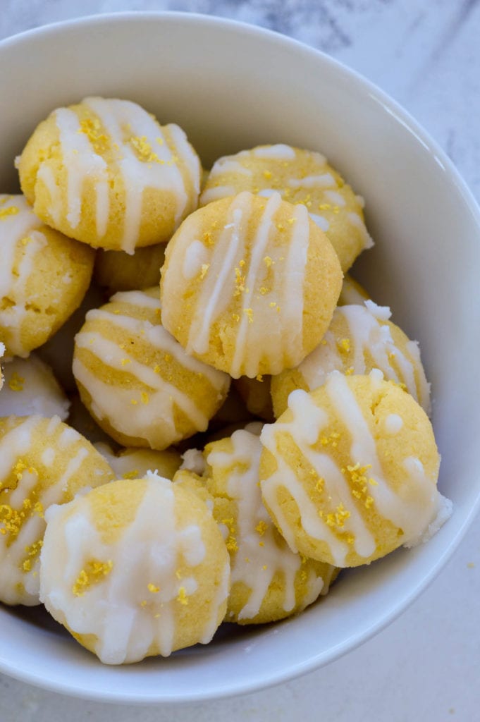These Keto Lemon Cake Mix Cookies are just under 1 net carb each and bursting with citrus flavor! A box of keto yellow cake mix has never tasted SO good.