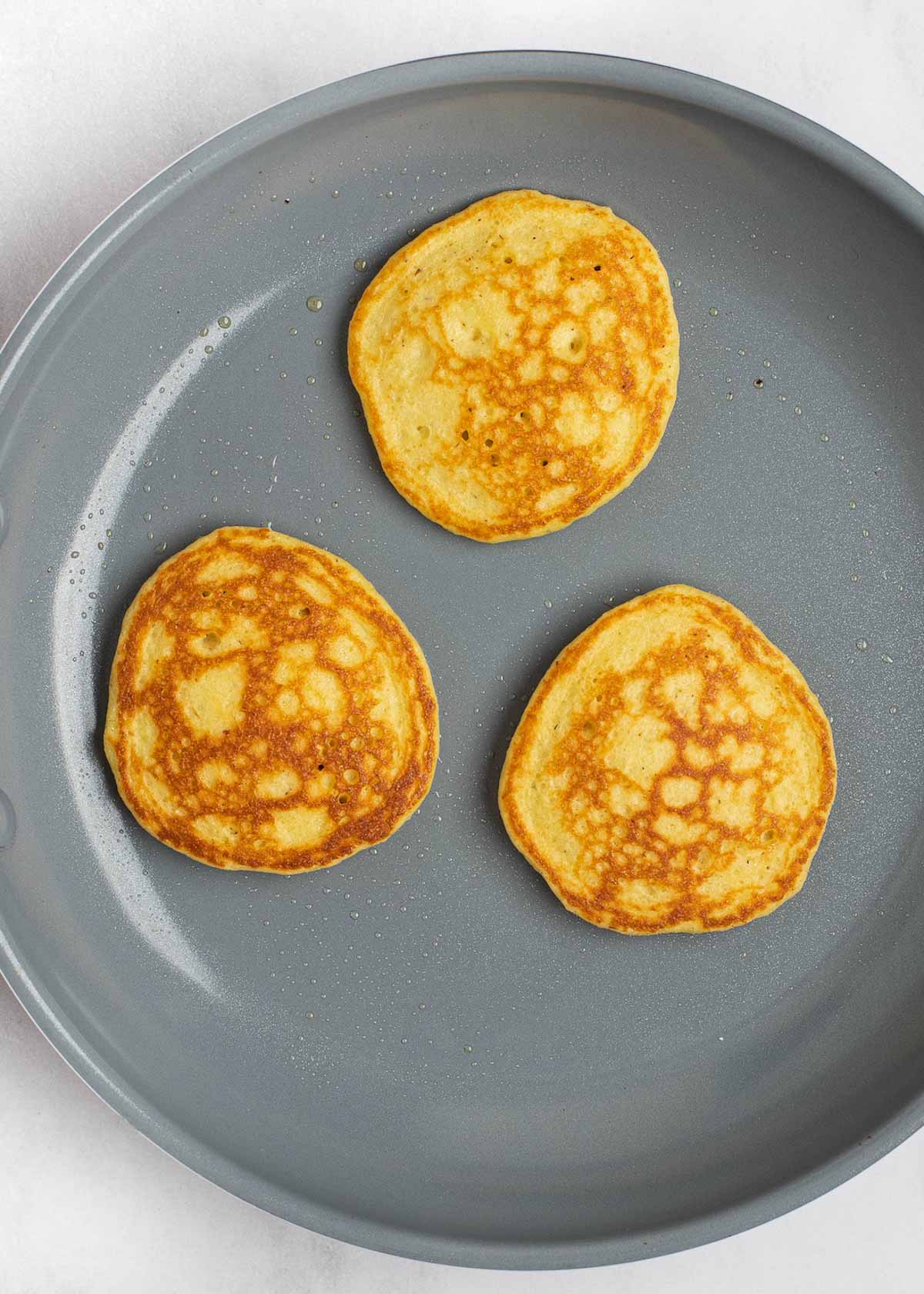 These fluffy Keto Pancakes come out perfect every time! Enjoy three low-carb, gluten-free pancakes for less than 5 net carbs!