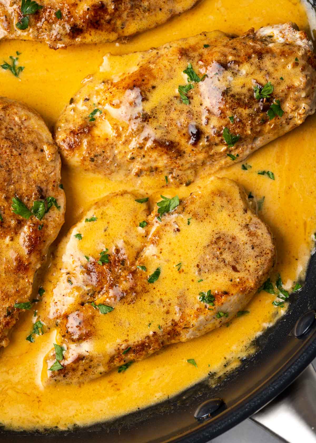 This Chicken Lazone recipe is a Cajun classic. Tender chicken breasts are smothered in a creamy sauce that has just the right amount of heat! This recipe is packed with delicious flavor and incredible texture. Whether you're cooking for guests or preparing a weeknight meal this is great dish that is ready in less than 30 minutes!