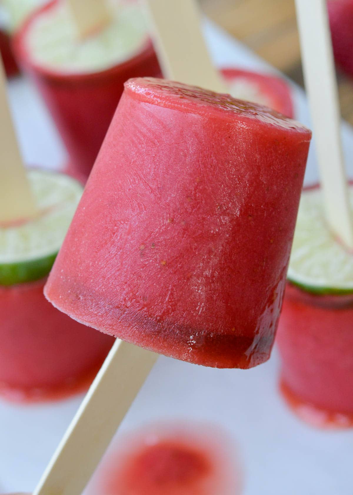 These delicious Low Carb Strawberry Margarita Popsicles will keep you cool all summer long! Just 5 net carbs each for these tasty tequila popsicles.
