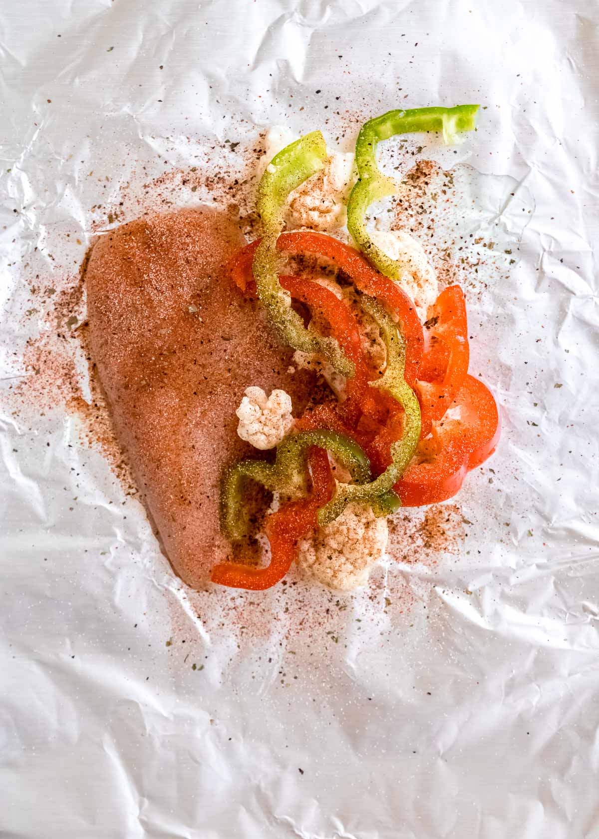 buffalo chicken ingredients laid onto open foil pack