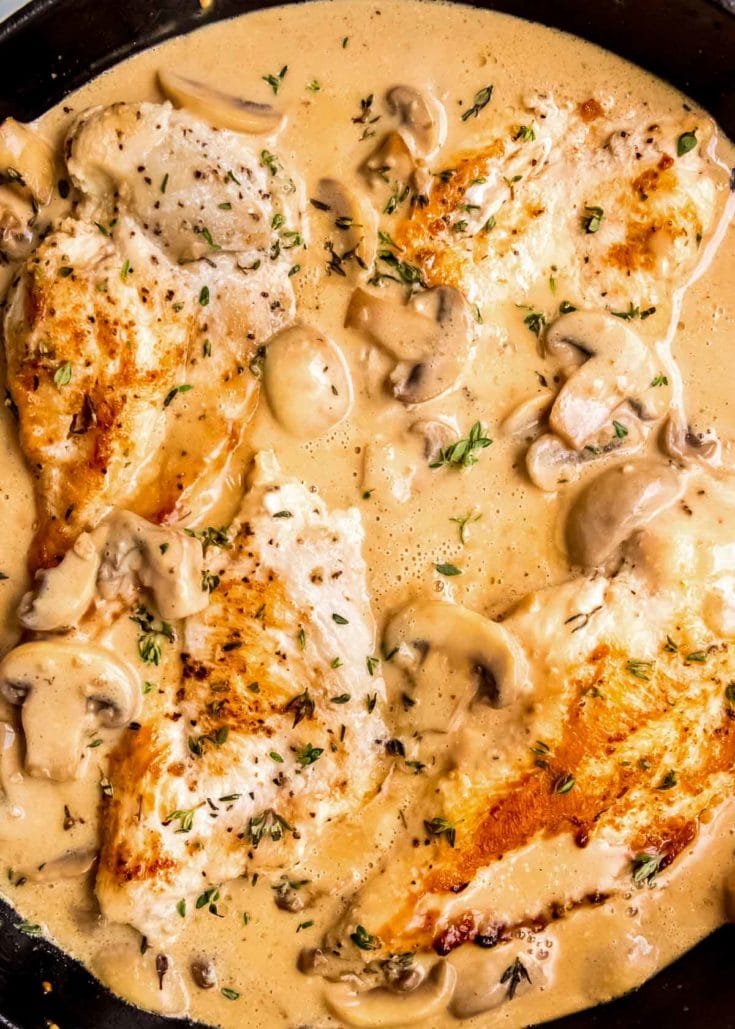 This Creamy Chicken Marsala recipe features tender, seasoned chicken in creamy marsala wine and mushroom sauce. This dinner is perfect for guests because it is a restaurant-quality meal that is deceptively simple to prepare!