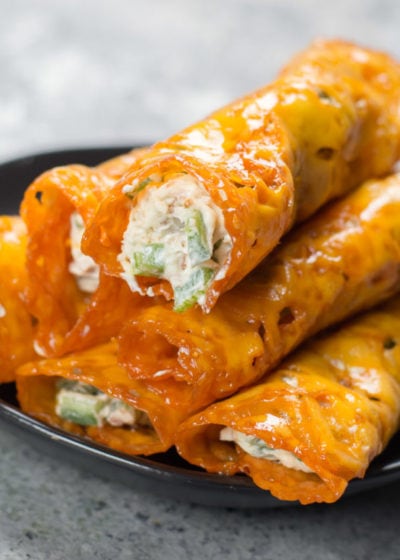 These Jalapeño Popper Keto Taquitos are loaded with fresh jalapeños and bacon! This is the easiest keto appetizer ever and under three net carbs per serving!