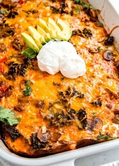 This easy Low-Carb Breakfast Casserole is super filling and full of healthy ingredients! Tender mushrooms, peppers, onions, and kale pair perfectly with your favorite sausage, eggs, and cheese.