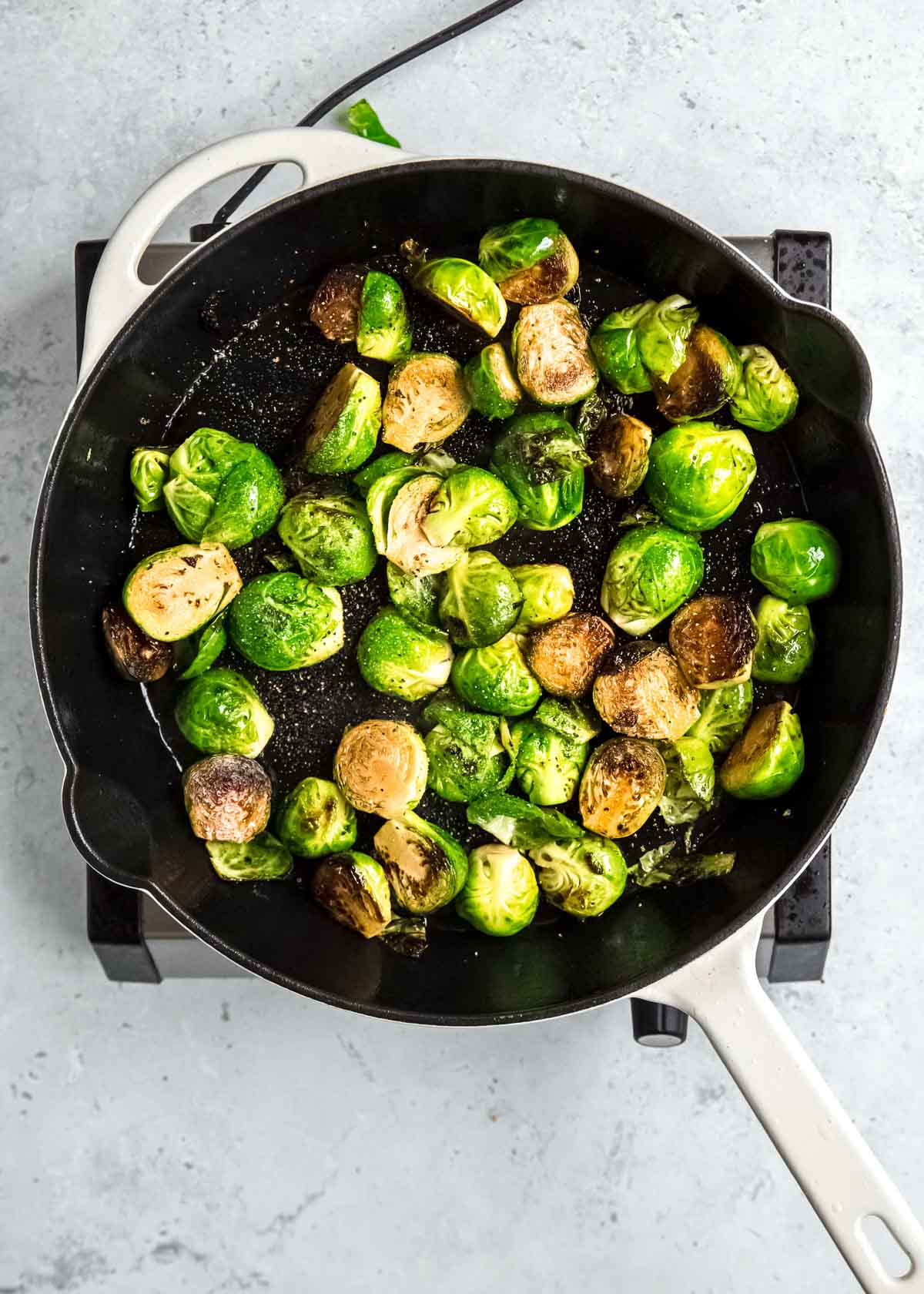 brussels sprouts with balsamic vinegar and sweetener mixture poured in
