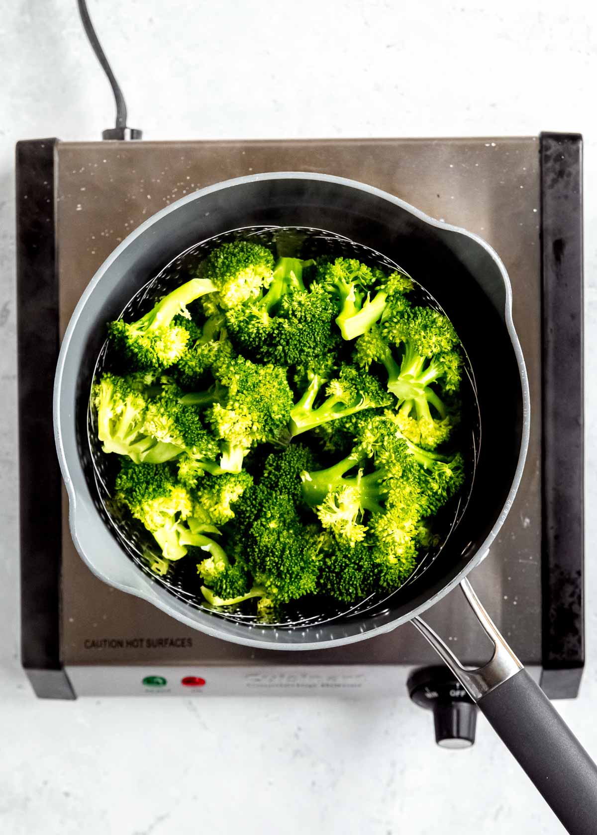 steamed broccoli in a pot
