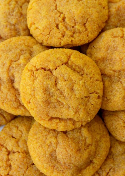 pumpkin cookies stacked on each other