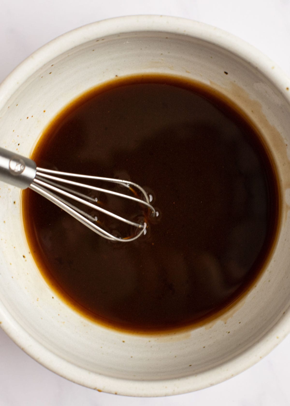 a keto sauce made with soy sauce, fish sauce, oyster sauce, monk fruit, and water