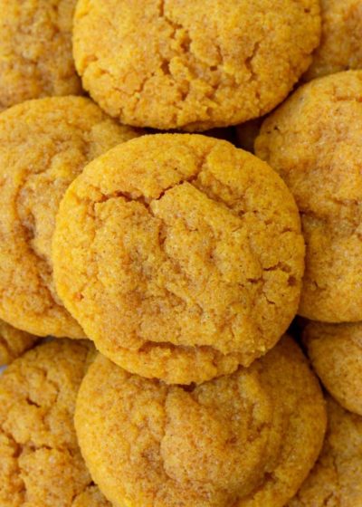 pumpkin cookies stacked on each other