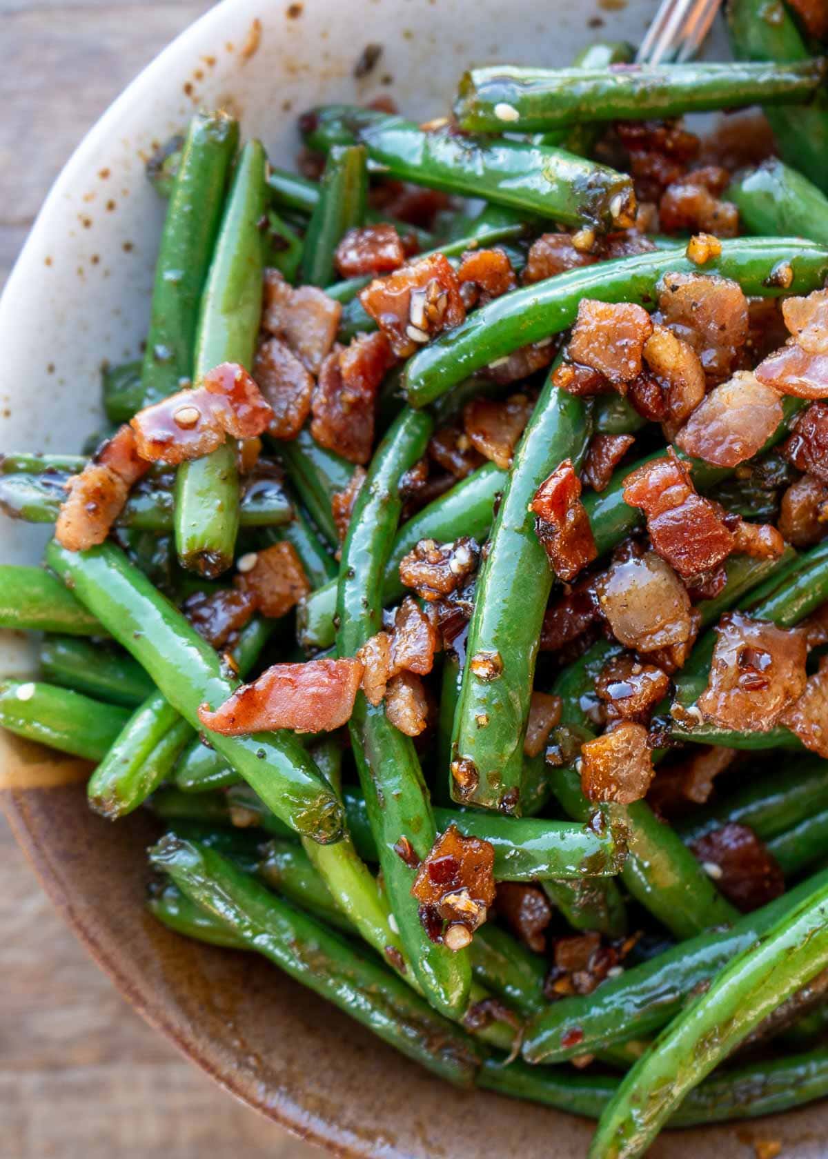These Sweet and Spicy Green Beans will be your new favorite keto side dish! This easy recipe is ready in just 20 minutes and has just 5 net carbs per serving.