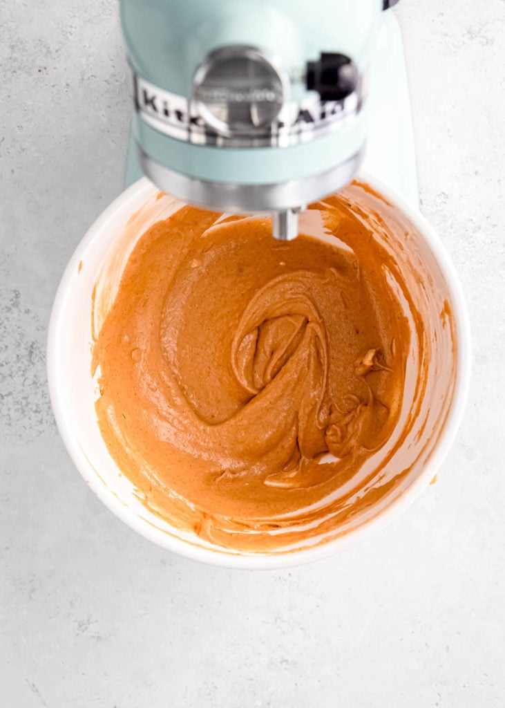 whipped pumpkin cream cheese mixture in a mixing bowl