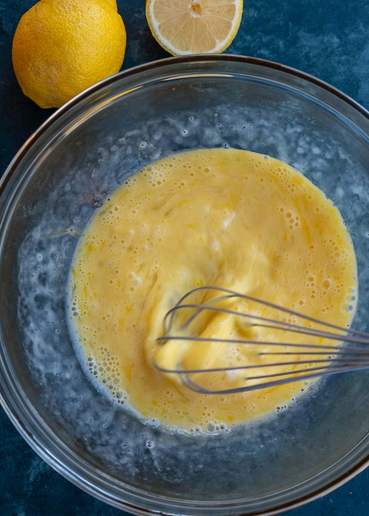 broth poured into eggs while whisking to temper eggs