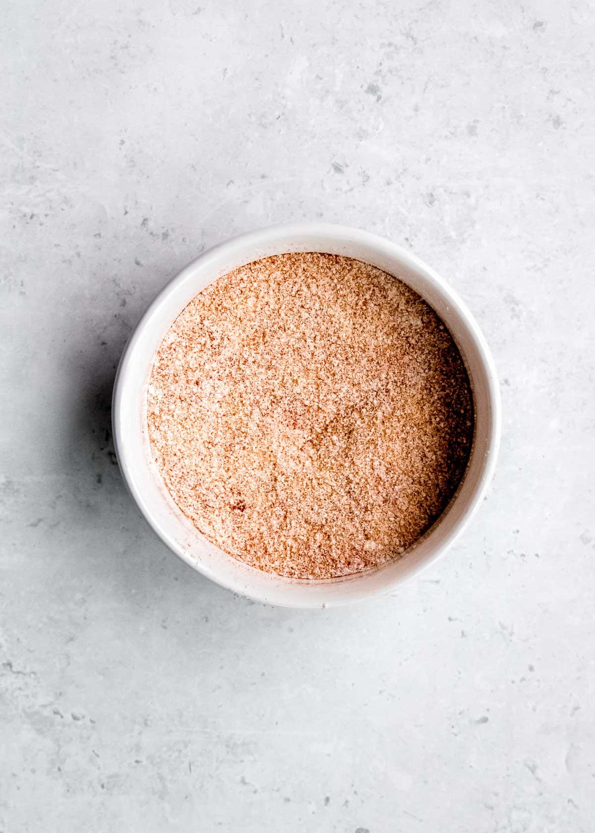 buffalo cauliflower seasoning in a white bowl