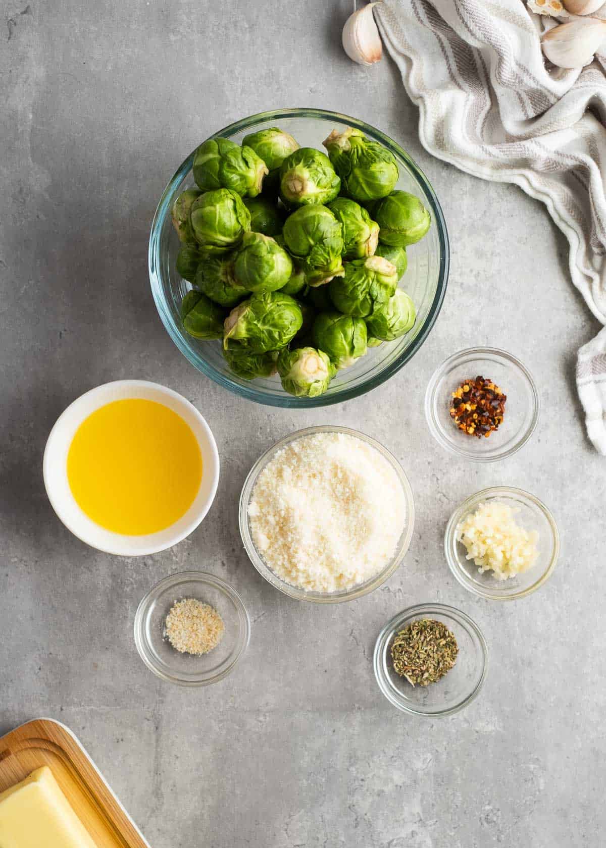 parmesan brussels sprouts ingredients on a gray background