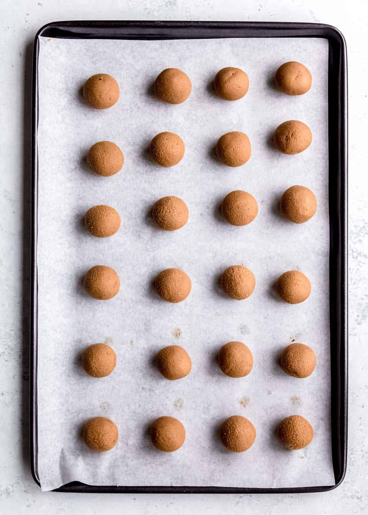 overhead image of shaped truffles on a baking sheet