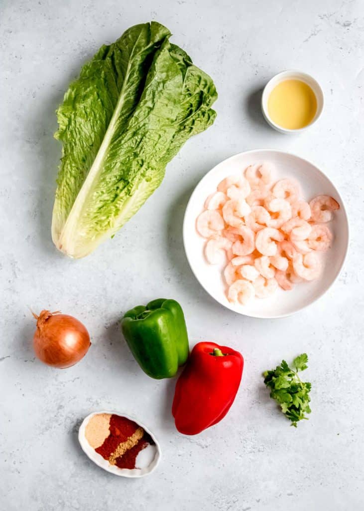 shrimp fajita lettuce wrap ingredients on a white table