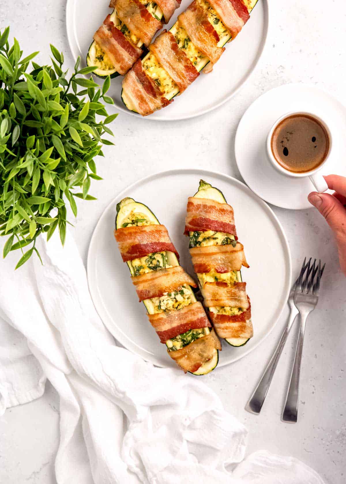 overhead image of bacon wrapped zucchini boats